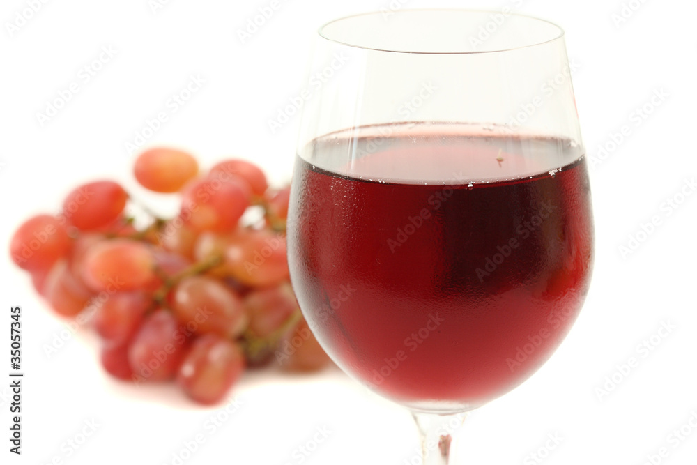 Red wine glass with grape isolated on white background Red wine glass with grape isolated on white background
