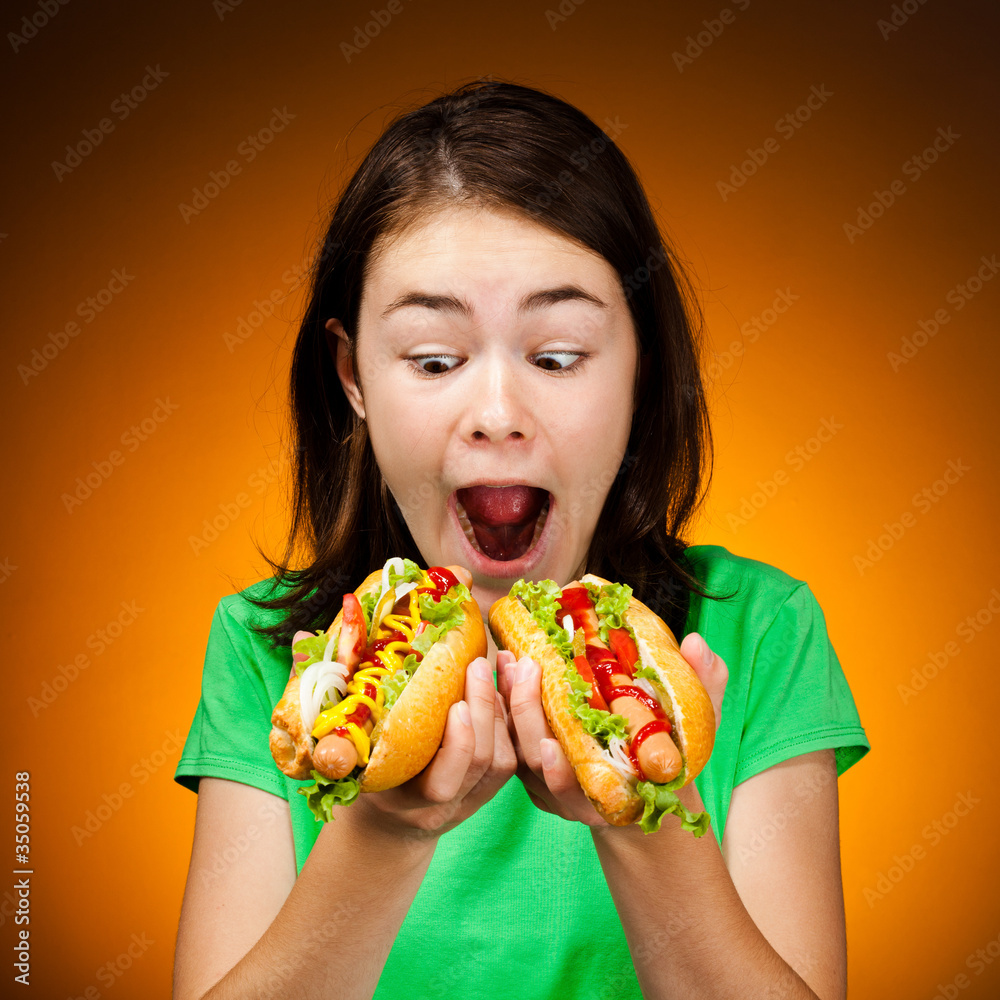 Girl eating big sandwiches