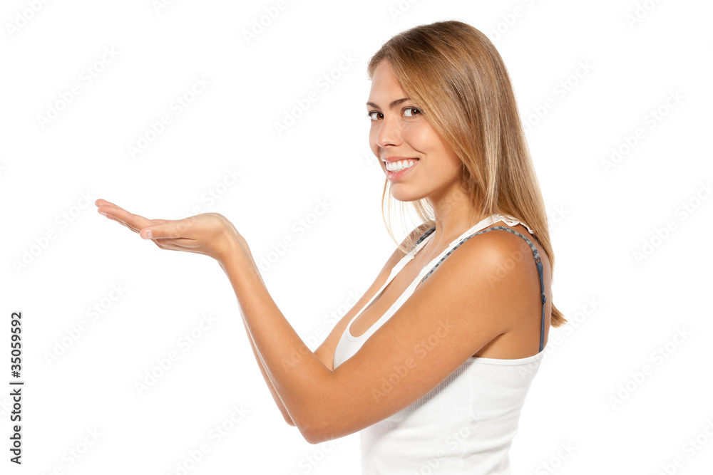 Portrait of woman showing a product - empty copy space Portrait of woman showing a product - empty copy space