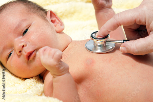 Stethoscope listening to a baby's heart beat