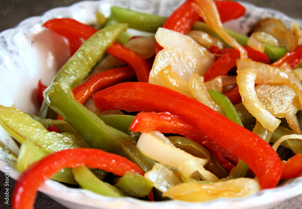 Sauteed red peppers, green peppers and onions Sauteed red peppers, green peppers and onions