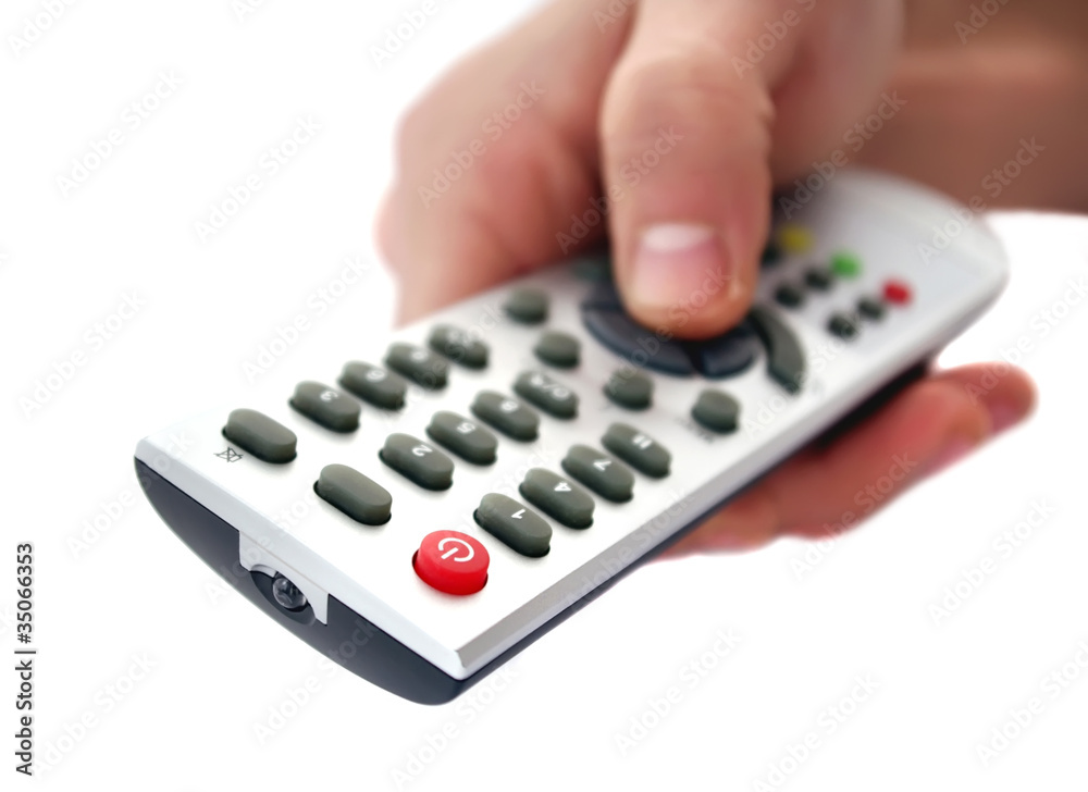 changing channel with remote control in hand changing channel with remote control in hand