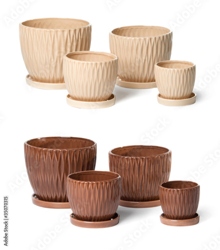 Fototapeta Naklejka Na Ścianę i Meble -  Set of ceramic flowerpots for indoor plants