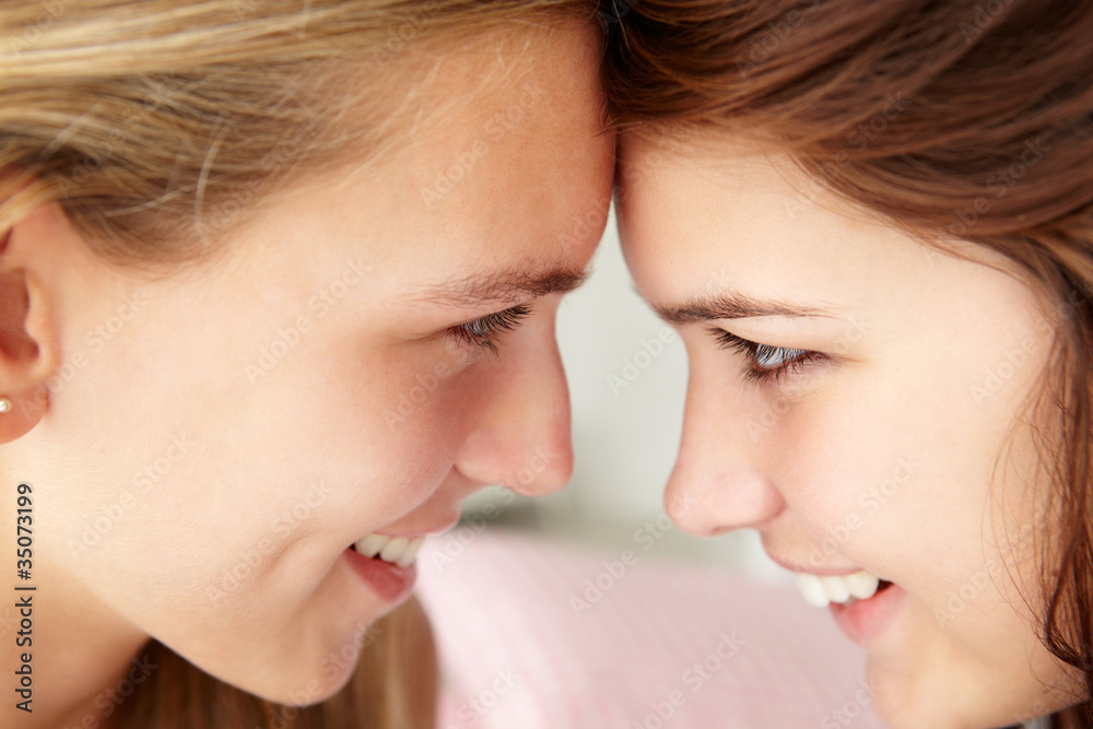 Close up portrait of teenage girls in profile