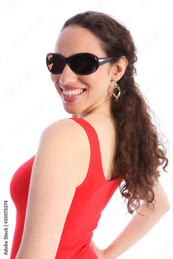 Beautiful happy smiling young woman in sunglasses Beautiful happy smiling young woman in sunglasses