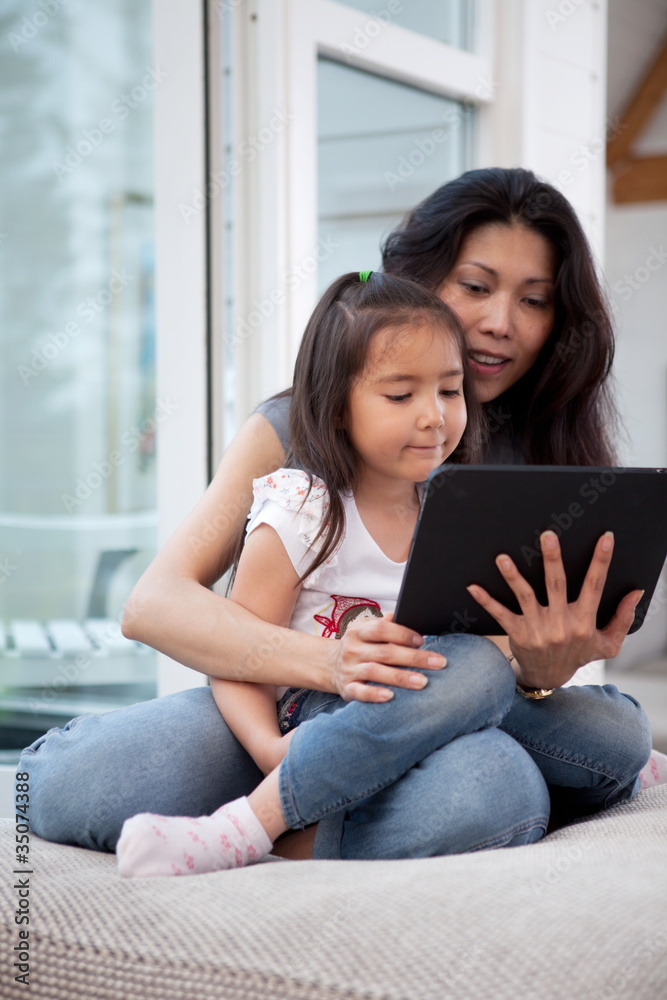 Mother and Daugther with Digital Tablet Mother and Daugther with Digital Tablet