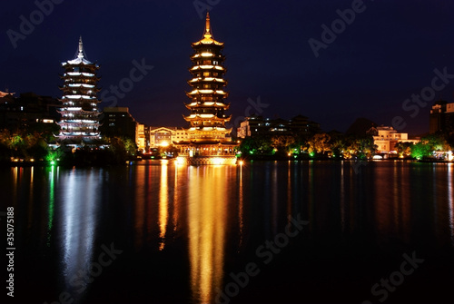 Double wooden towers in guilin of china nightscape