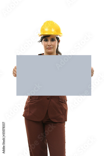 Young woman holding blank board