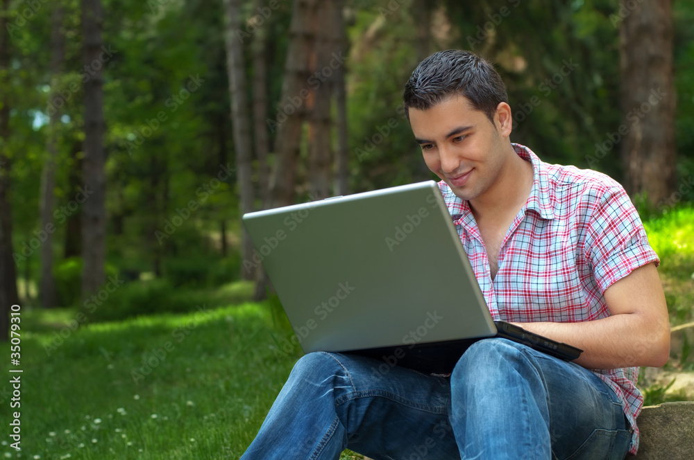 Young men with lap-top Young men with lap-top