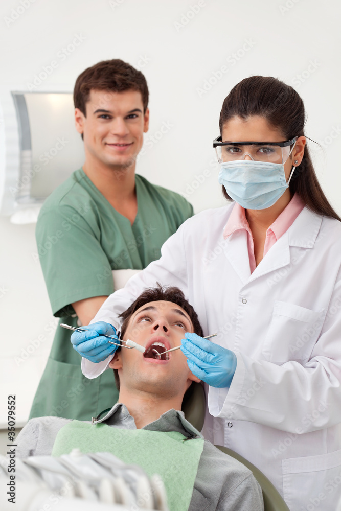 Patient having dental check up Patient having dental check up