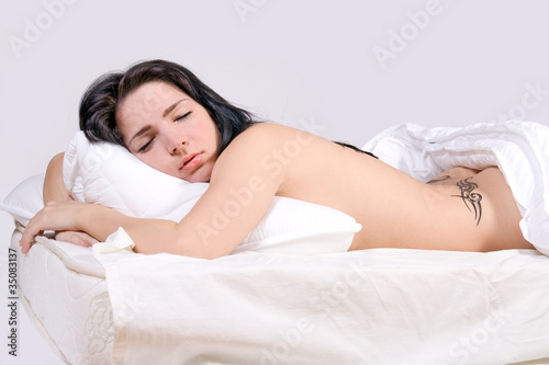 Beautiful girl sleep on bed © milkovasa