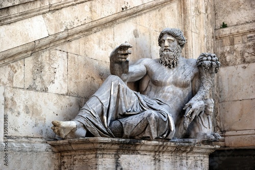antique sculpture of roman idol in Rome
