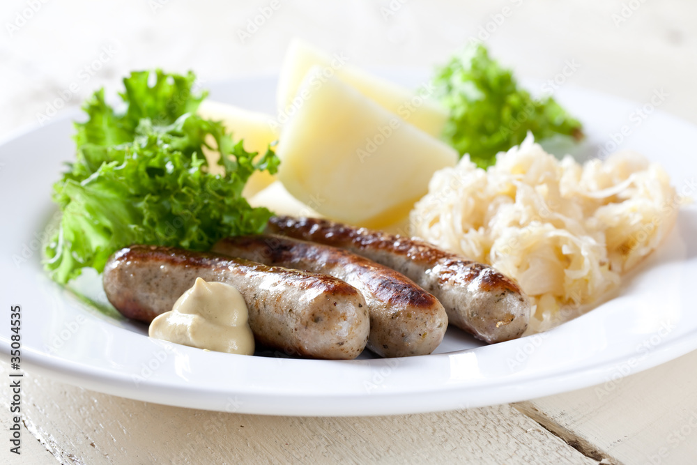 Würstchen mit Sauerkraut Stock Photo | Adobe Stock