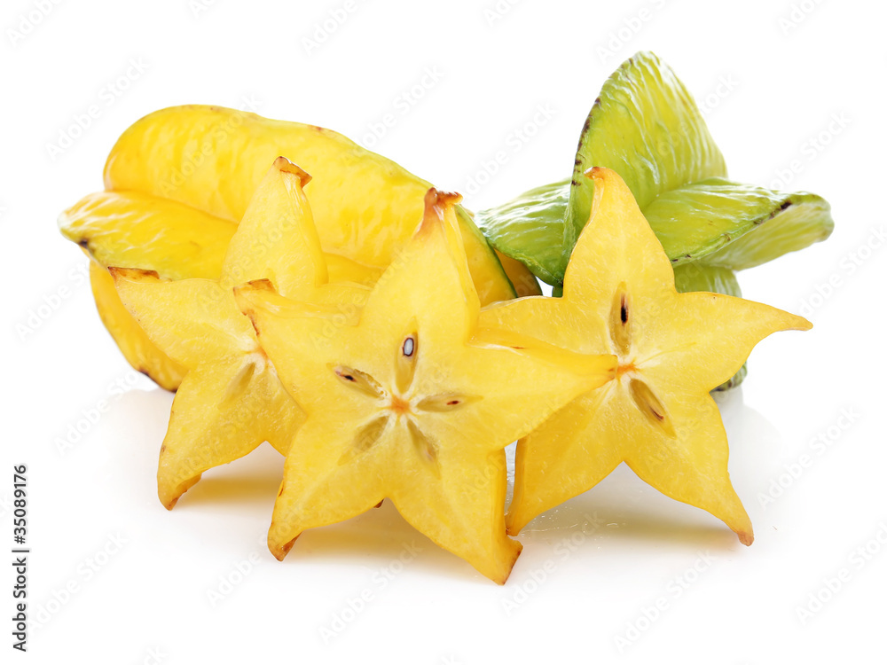 Fototapeta premium Carambola fruit with slices isolated on white
