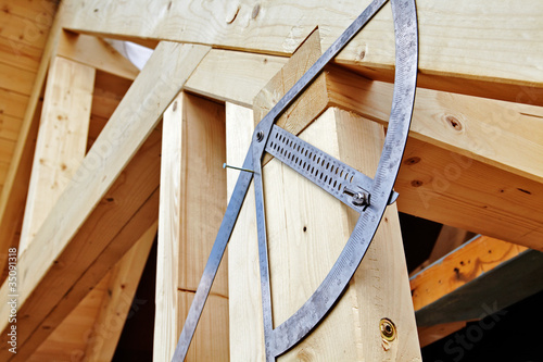 carpenters constructing a dormer photo