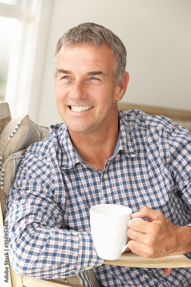 Mid age man at home Mid age man at home