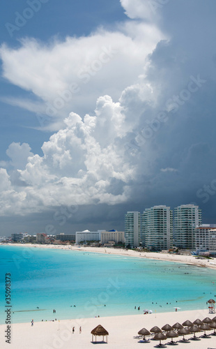 Storm clouds cover towers of a resort near Punta Cancun © Dmitri Kotchetov