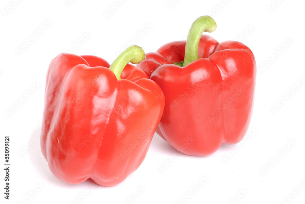 two red pepper isolated on white background
