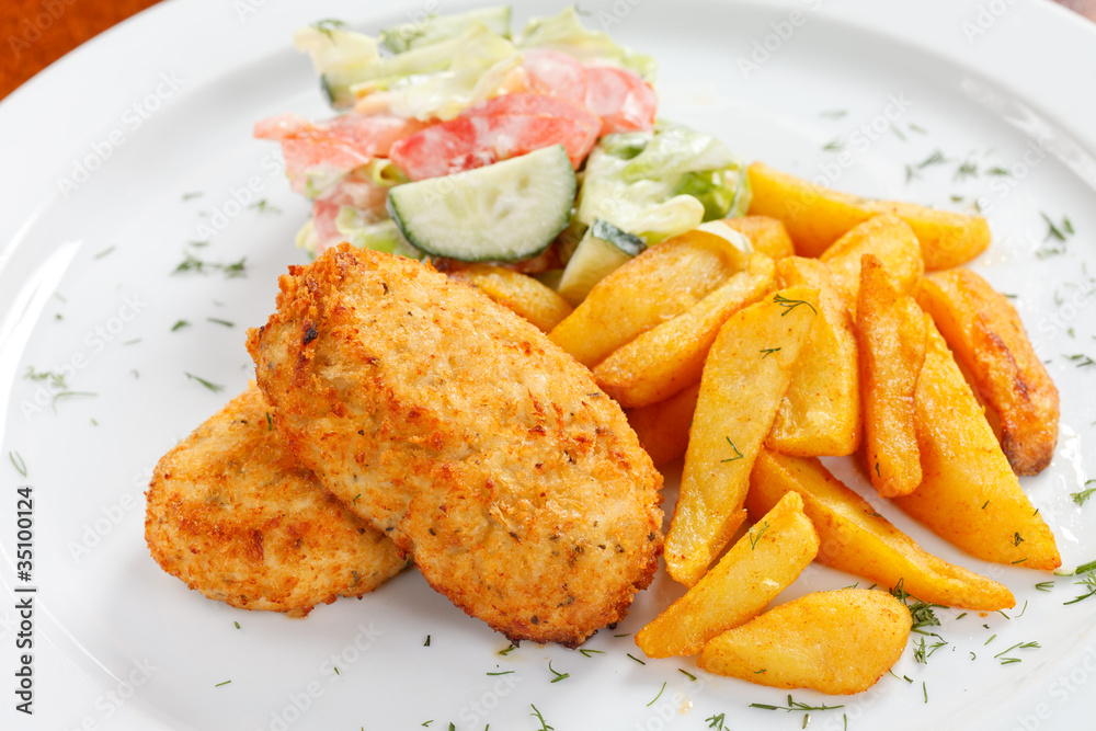chicken cutlet with fried potatoes chicken cutlet with fried potatoes