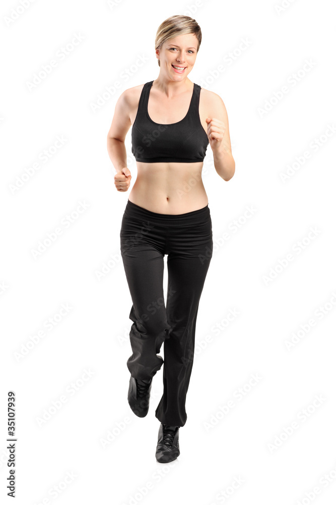 Full length portrait of a blond female running Full length portrait of a blond female running