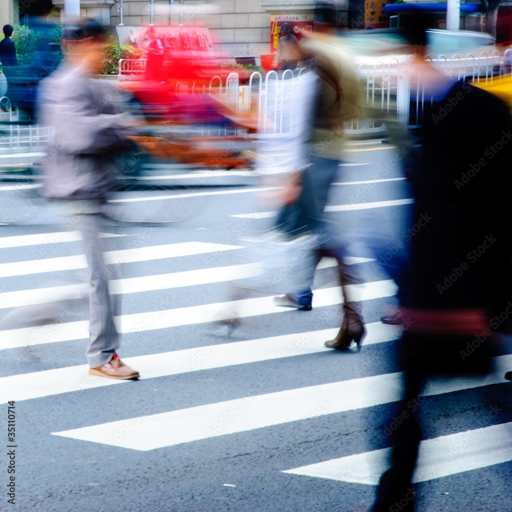 people on zebra crossing street