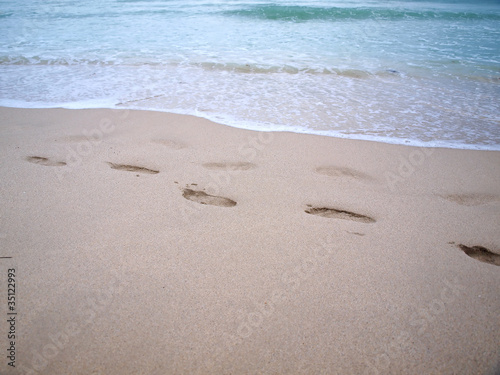 south beach footprints in sand