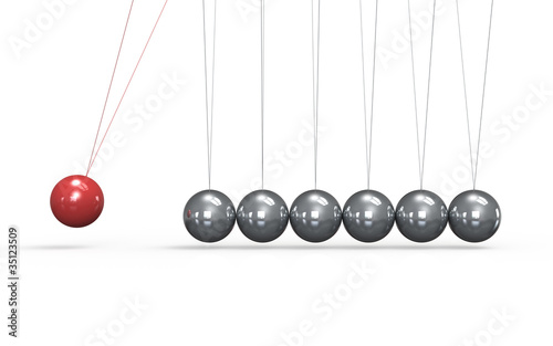 Newtons cradle White floor. One red Ball in the Pendulum.