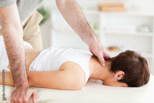 Young woman being massaged