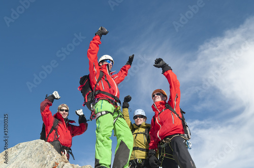 Bergsteiger am Gipfel photo