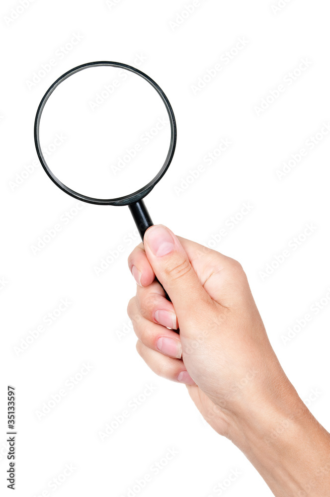 Magnifying glass in hand Magnifying glass in hand