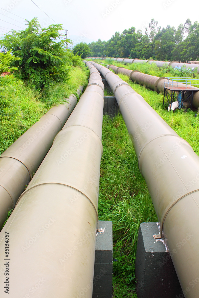 Industrial machines and pipes in a power plant Industrial machines and pipes in a power plant