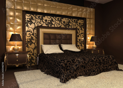 Romantic interior. Double bed in golden luxurious interior. Hote