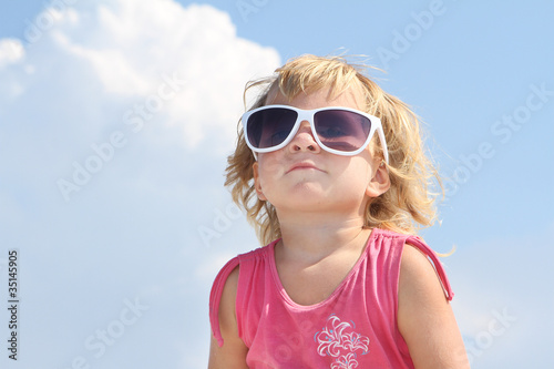 cute young girl in sun glasses