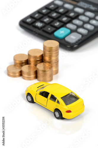 Toy car,calculator and coins