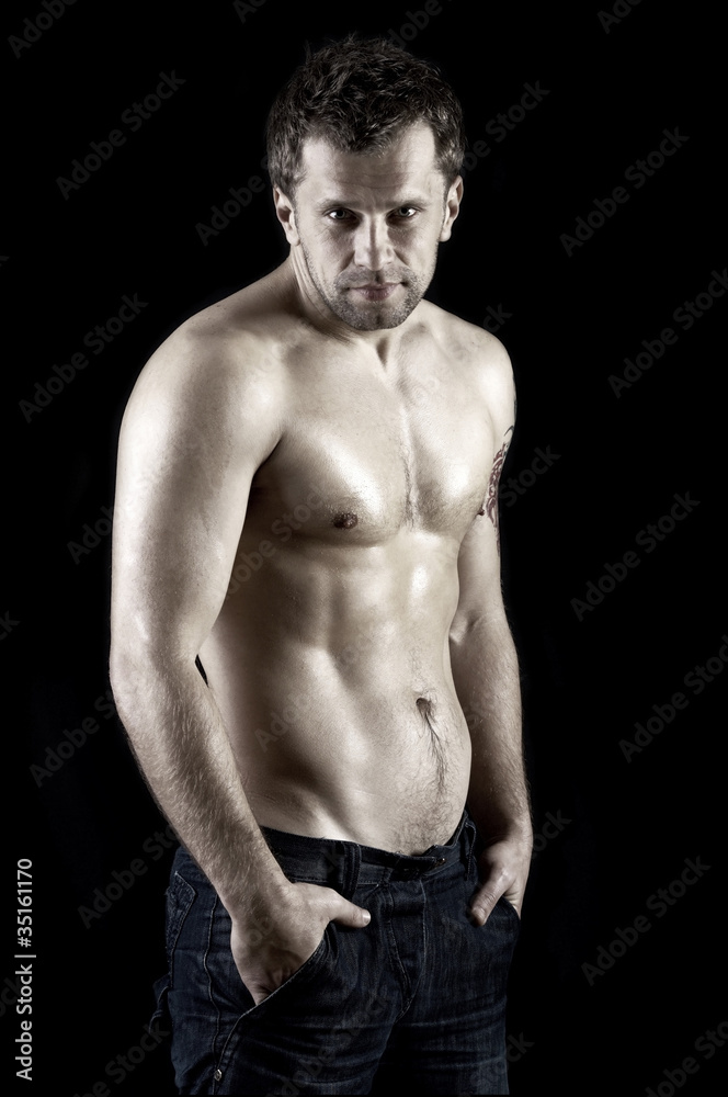 Naked muscular male model in jeans Naked muscular male model in jeans