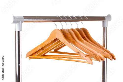 wooden clothes hangers isolated on white