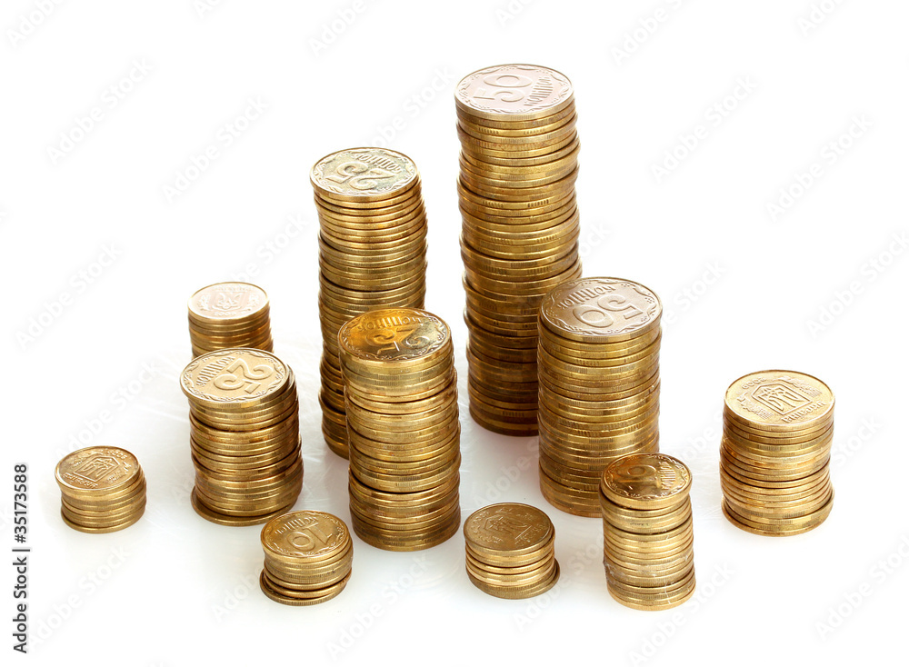 Many coins in column isolated on white Many coins in column isolated on white