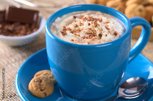 Hot chocolate, whipped cream and chocolate shavings