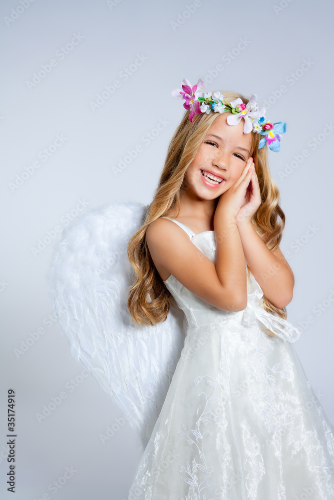 Angel children blond girl with sleeping hands gesture Angel children blond girl with sleeping hands gesture