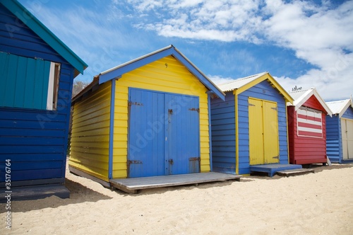 Colourful beach huts © Vividrange