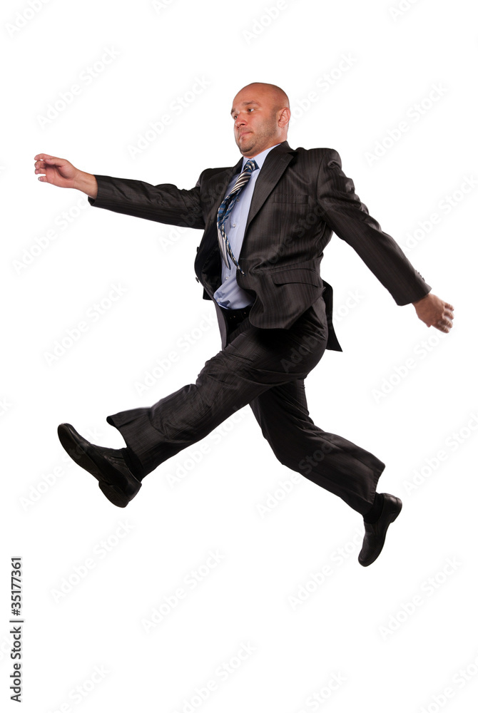 man in business suit flies
