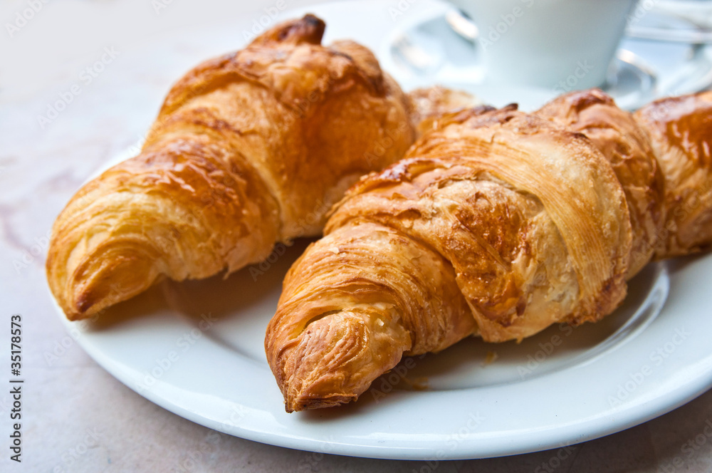 Breakfast with coffee and croissant Breakfast with coffee and croissant