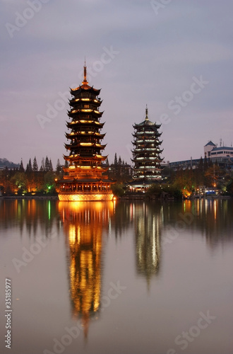 Double wooden towers in guilin of china nightscape