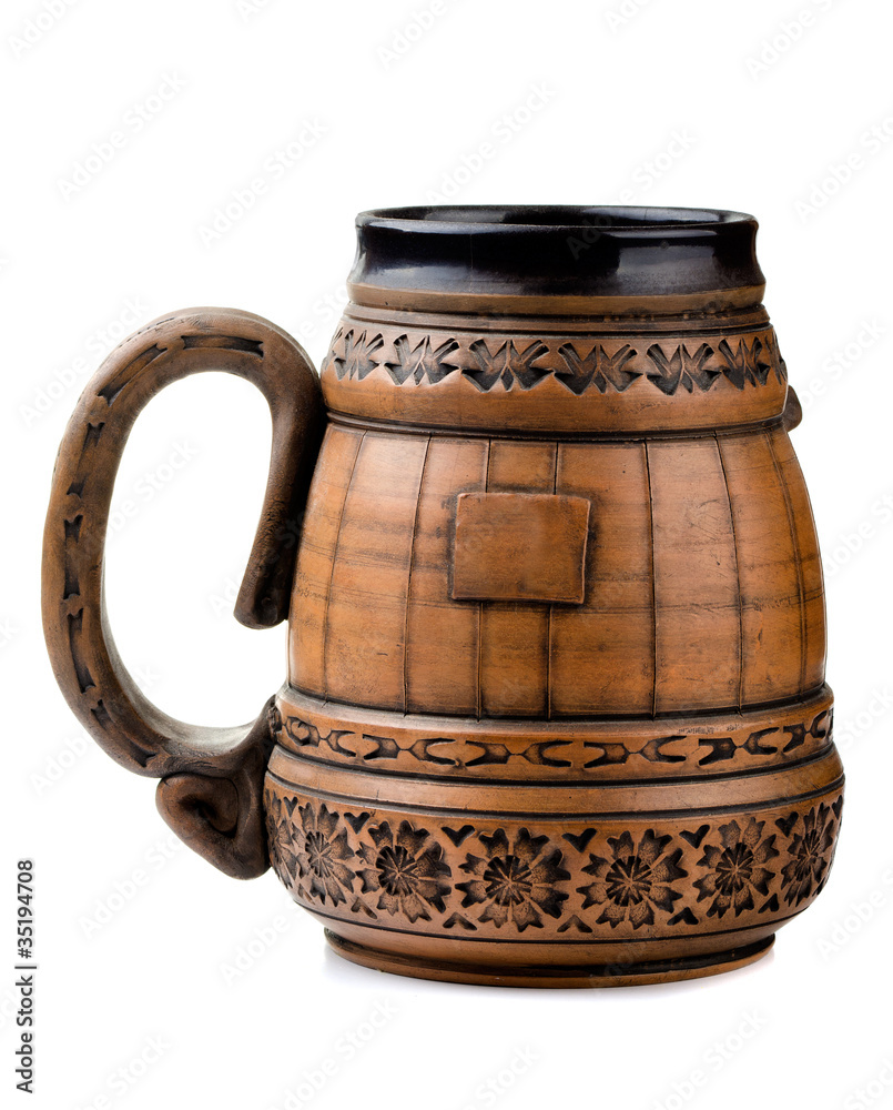 Old clay beer mug isolated on white Old clay beer mug isolated on white