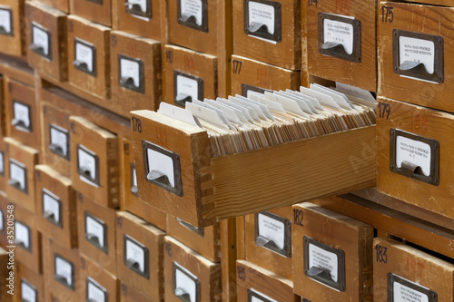 database concept. vintage cabinet. library card or file catalog.