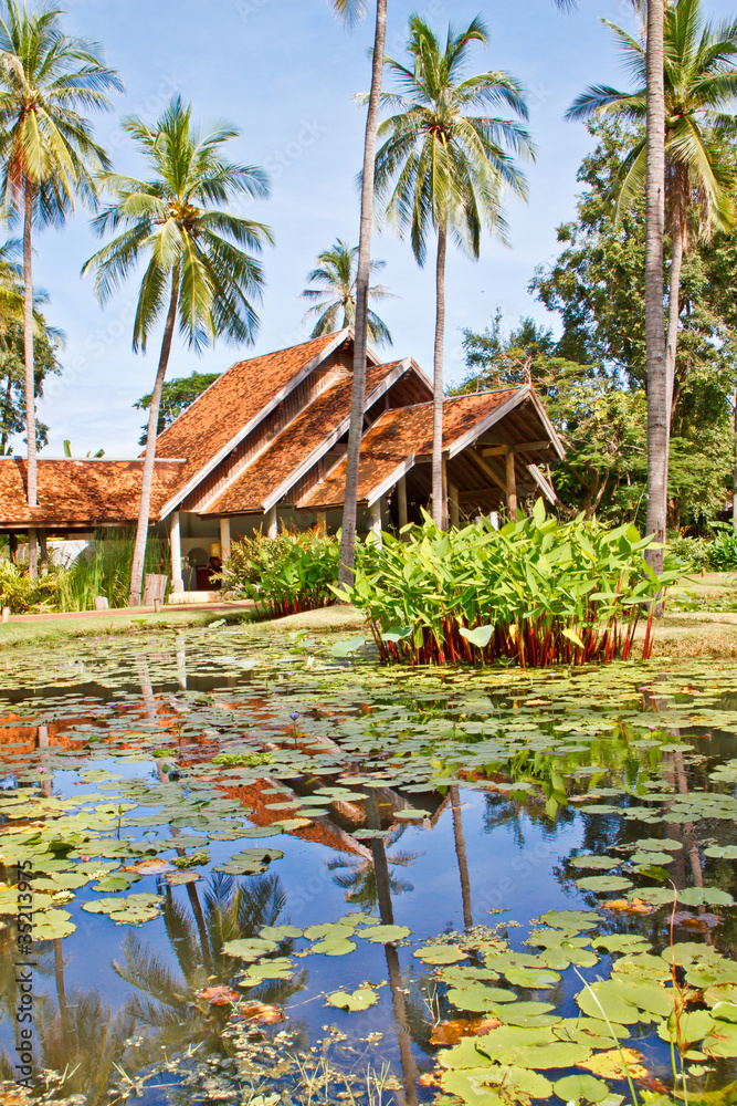 Obraz staw lotosu i budynek w stylu tajskim