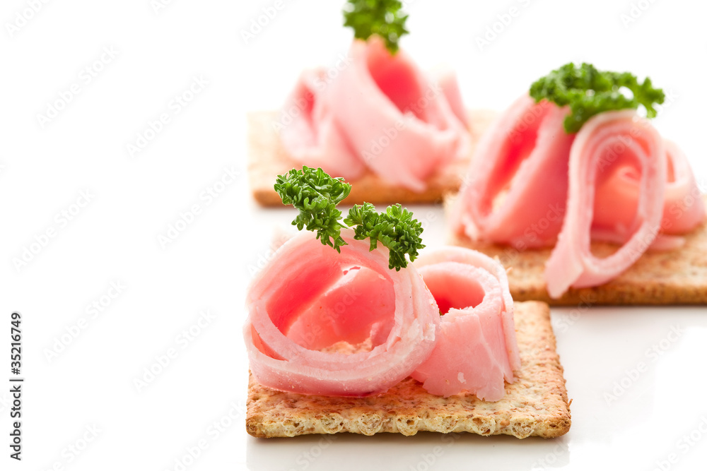Cracker con Prosciutto cotto - Antipasto - Isolated Cracker con Prosciutto cotto - Antipasto - Isolated