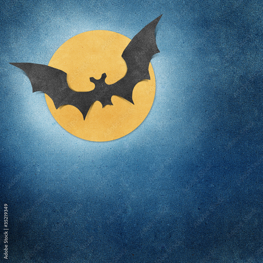 Halloween bat and full moon recycled papercraft background