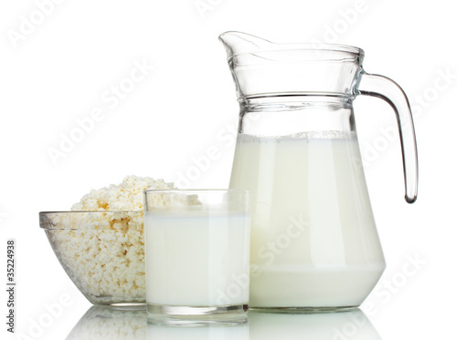 Sour cream, cottage cheese and milk isolated on white