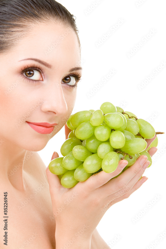 Pretty woman with grape on the white background Pretty woman with grape on the white background